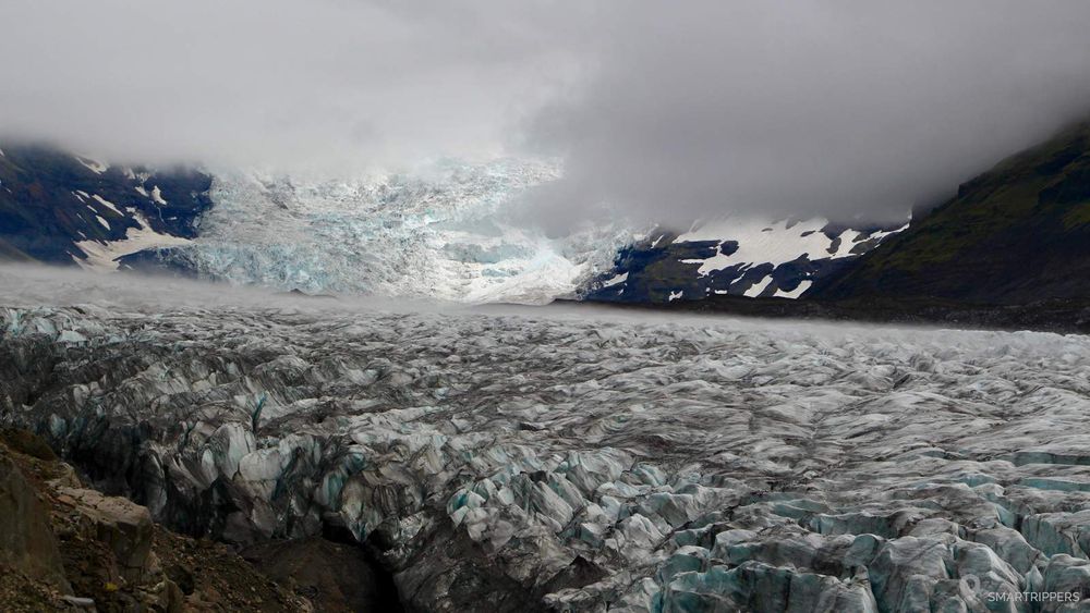 The glacier's getting higher in the distance.