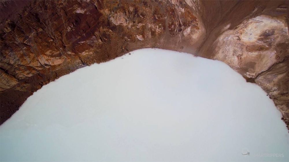 The milky and warm waters of the Víti crater